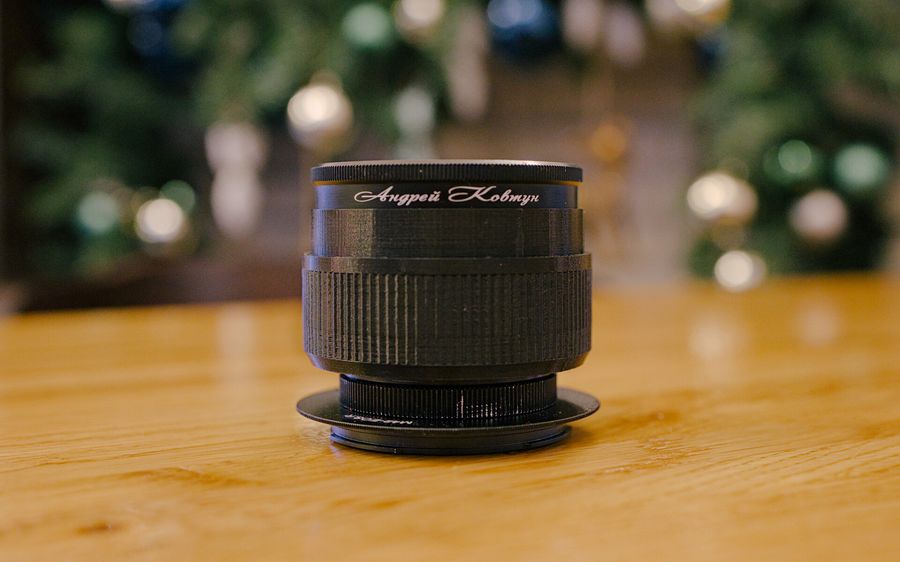 Saturn monocle lens with engraved name